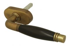 Poignée (1928) laiton patiné bois d'ébène