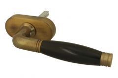 Poignée (1926-1928) laiton patiné bois d'ébène