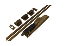 Crémone à levier en applique laiton patiné (1895)