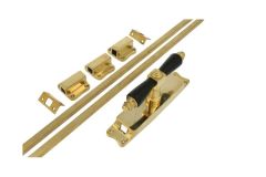 Crémone en applique laiton poli bois d'ébène (1900)