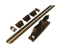 Crémone en applique laiton patiné bois d'ébène (1900)