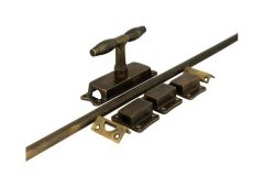 Crémone en applique pour fenêtre (1932) laiton patiné