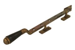 Entrebailleur de fenêtre laiton patiné bakélite (1908)