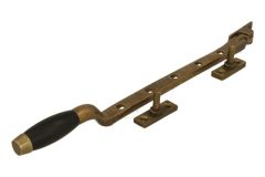 Entrebailleur de fenêtre laiton patiné bois d'ébène (1932)